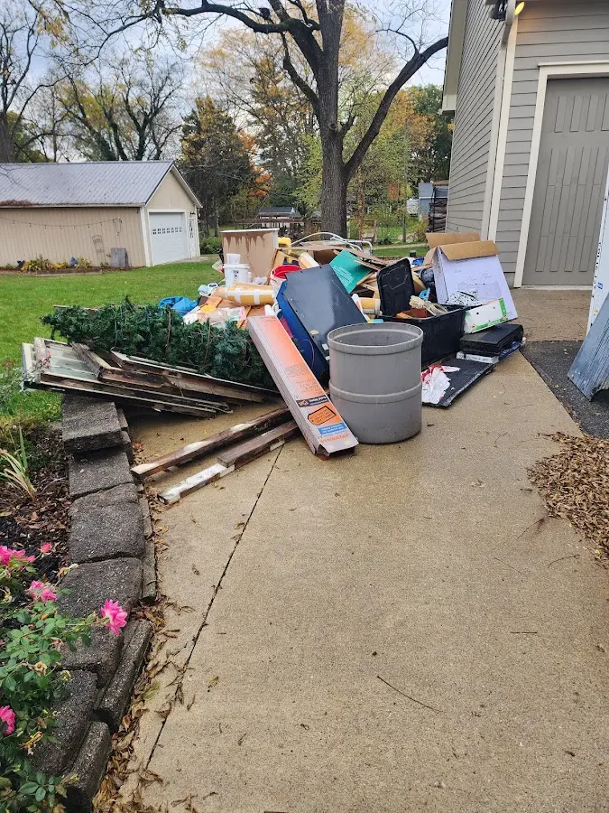 Dumpster being loaded with debris for 30 Yard Dumpster Rental in Foster City